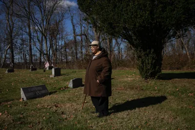Janis Ivory in the cemetery where her parents are buried in Rendville, OH where she grew up. Janis, her brother Harry and others are working to revitalize the old coal town.